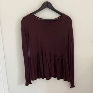 Long sleeved peplum top